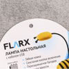 Hand Held Gadget That Attaches Clothing Tags